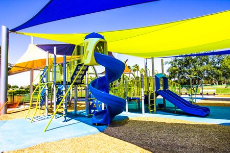 Children's Playground Equipment And Slides Under Canopiesの写真素材