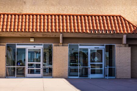 Entrances To Two Vacant Store Fronts In Strip Mallの写真素材