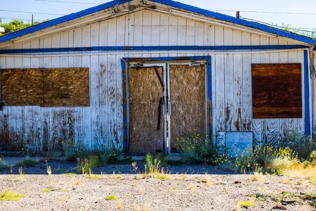 Boarded Up Double Door Entrance To Abandoned Building