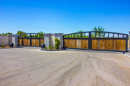Entrance/Exit Automatic Wood & Metal Gates