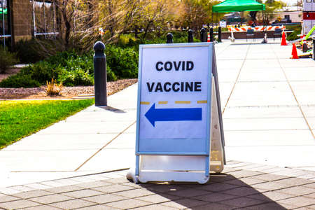 Covid 19 Vaccine Directional Sign At Local Libraryの写真素材