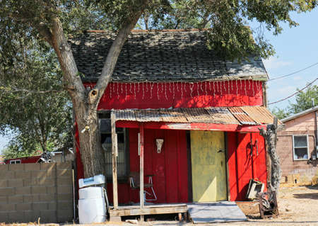 Abandoned Home With Machinery And Junkの写真素材
