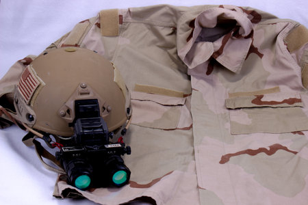American Military Helmet With Night Vision Goggles On Camouflage Shirt