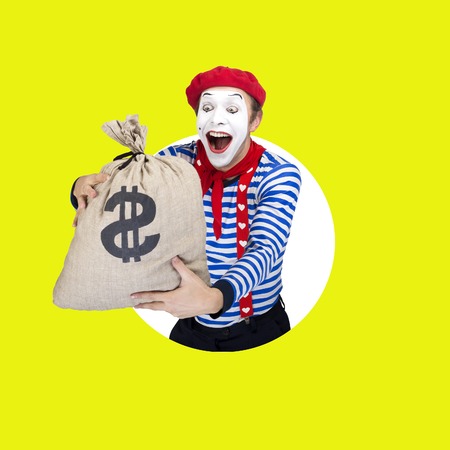 Mime with money bag.Emotional funny actor wearing sailor suit, red beretの写真素材