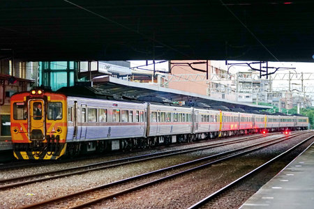 Train at railway station.