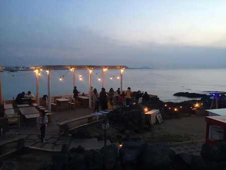 A cafe with sunset view beside sea in jeju islandのeditorial素材