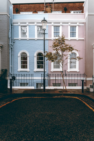A pastel blue and rose colored house in Londonのeditorial素材
