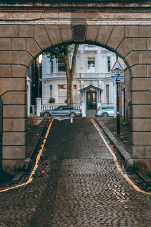 Exiting Holland Park Mews after the rainのeditorial素材
