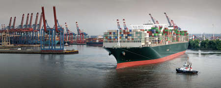 Panorama of a large container ship in the port of Hamburgの写真素材