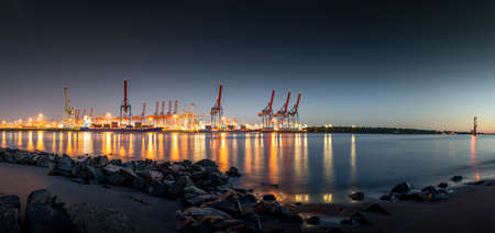 Panorama at night in Hamburg harborの写真素材
