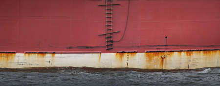 Exterior of a red ship hullの写真素材