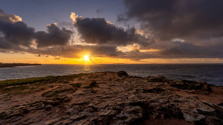Sunset on the coast of Peniche in Portugalの写真素材
