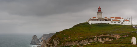 Lighthouse on the coast of the seaの写真素材