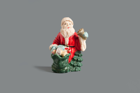 Santa claus figure with a golden bellの写真素材