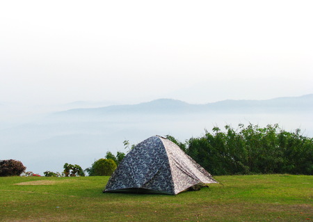 a Tent with a sea of cloud in Northern of Thailand. Morning Timeの写真素材