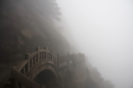The Mist, a Foggy Rainny day. Stone Steep Steps . Trekking walking hiking Huangshan Mountain. Anhui, China. 13th,April 2009の写真素材