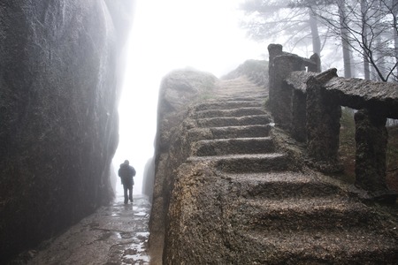 The Mist, a Foggy Rainny day. Stone Steep Steps . Trekking walking hiking Huangshan Mountain. Anhui, China. 13th,April 2009の写真素材