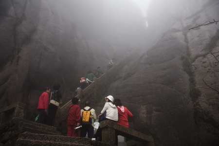 The Mist, a Foggy Rainny day. Stone Steep Steps . Trekking walking hiking Huangshan Mountain. Anhui, China. 13th,April 2009のeditorial素材