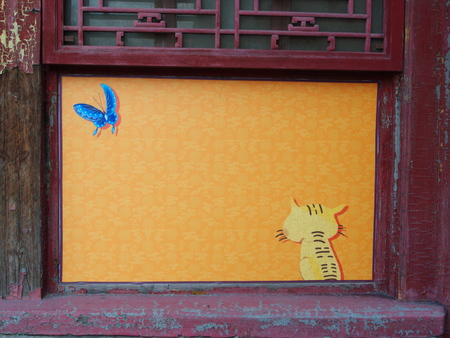 The windows with a Cat Painting in  The Building in forbidden City. The Most Famous Imperial Palace in Asia. Beijing City, China.  24th October, 2017のeditorial素材