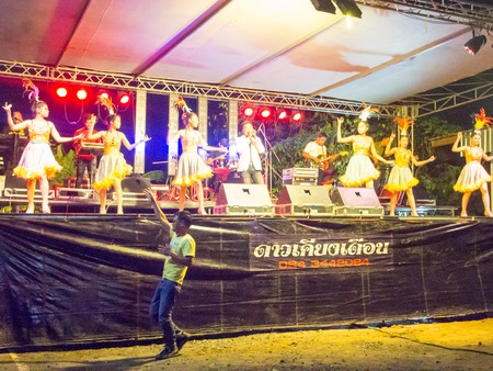 Local Concert with thai girl group dancing the Temple Event in Burirum Province, 22th April, 2018.のeditorial素材