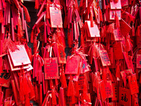 Red lucky charms hanging in Confucius temple in Longmen Grottoes World Heritage Site in Luoyang City, Henan Province, China, 14th October 2018.のeditorial素材