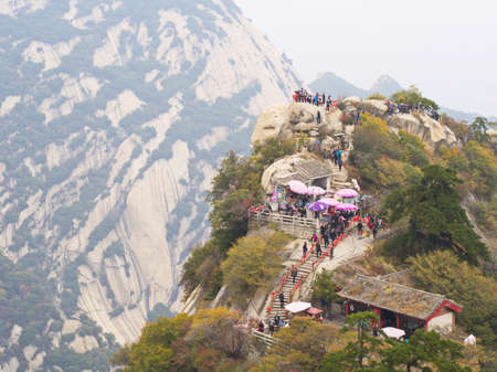 Huashan Mountain near Xian City. The Most dangerous Trail and Crowned People in China. Mount Hua is one of the Five Great Mountains of China in Huayin City, Shaanxi Province, China, 18th October 2018.のeditorial素材