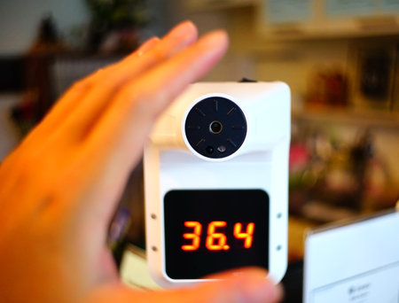 Body and Hand Temperature scanner. Thermal Sensor Technology for Covid-19 Quarantee Safe Zone Area.の写真素材