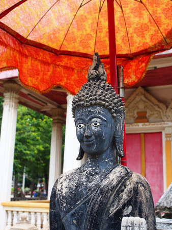 The face of a buddha.Head shot of buddha statue, Bangkok, Thailand. 8th May.2022.の写真素材