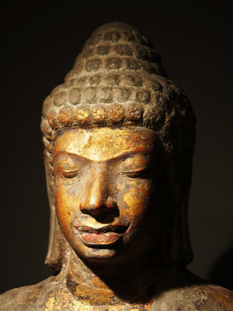 The face of a buddha.Head shot of buddha statue, Bangkok, Thailand. 8th May.2022.の写真素材