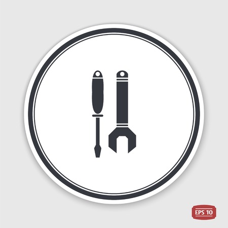 Vector wrench and screwdriver icon. Flat design style. Emblem or label with shadow.のイラスト素材