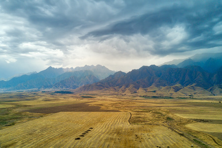 Thunderstorm View Towards Kyrgyzstan in Southern Kazakhstanの写真素材