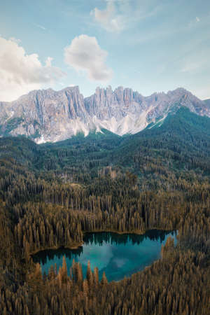 Lake Carezza in the Dolomites, Italy during Sunset, post processed using exposure bracketingの写真素材