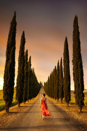 Woman in red dress in Tuscany taken in May 2022の写真素材