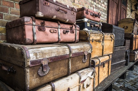 June 2016 - Vintage leather suitcases stacked vertically - Spreewald, Germanyの写真素材