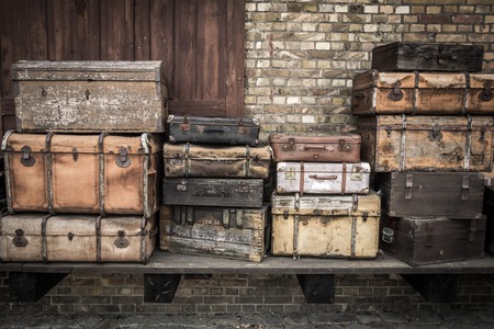 June 2016 - Vintage leather suitcases stacked vertically - Spreewald, Germanyの写真素材