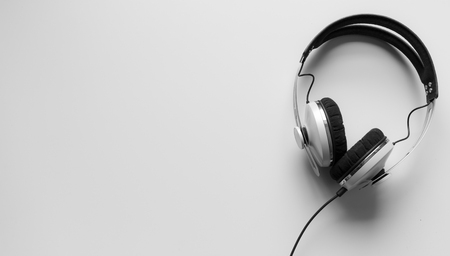 Single headphones on a tableの写真素材