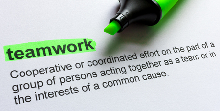 Definition of teamwork, highlighted in colourの写真素材