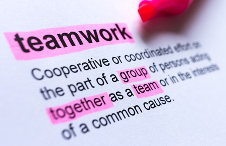 Definition of teamwork, highlighted in colourの写真素材