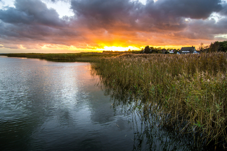 Beautiful sunset with nice reflections - Zingst, Germanyの写真素材