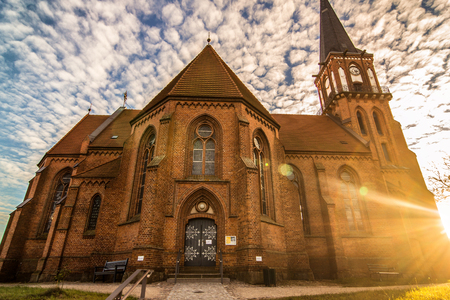 Beautiful church with a dramatic sky - Wustrow, Germanyの写真素材