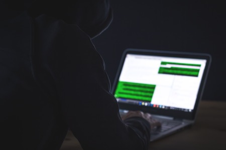 Computer hacker - unsecured network conceptの写真素材