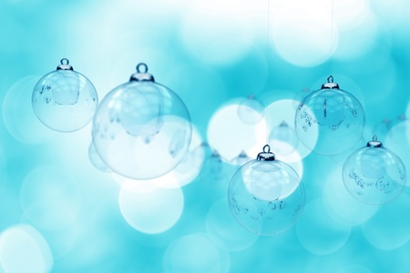 Christmas Glassy Ornaments. Blue Bokeh Beautiful Holidays Theme. Great As Holidays / Christmas Postcard For Your Company or Your Client. Bokeh Christmas Lights. Baby Blue Color. 3D Rendered Illustration.の写真素材