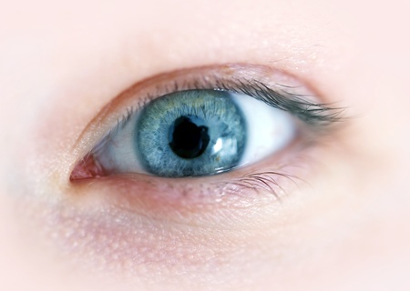 Female Eye Closeup Photography. Blue Human Eye.の写真素材