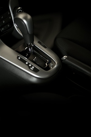 Automatic Drive. Automatic Transmission Console and Dashboard of the Modern Car. Dark Studio Photoの写真素材