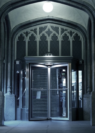 The Entrance - Chicago Architecture. Entrance with Glass Rotating Door. The Entrance - Vertical Photography.のeditorial素材