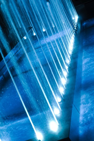 Modern Fountain Illuminated by Blue Led Lights  の写真素材
