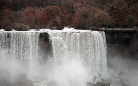 International Falls - Niagara Falls  Autumn Fall Photography  Taken From Canadian Side  American Side of Niagara Falls with Turists on the View Point  Horizontal Photo の写真素材