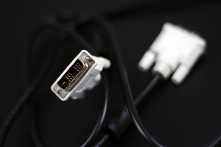 White DVI-D Dual Link Digital Monitor Cable on Solid Black Background  Technology Photo Collection の写真素材