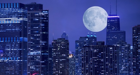 Skyline and Large Moon on the Horizon  Downtown Chicago with Hancock Tower on the Right Side  Panoramic Chicago Skyline のeditorial素材