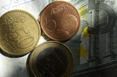 Euro Money New Light - New Day for European Union Currency  Euro Coins on Euro Bill Business Photo Theme の写真素材